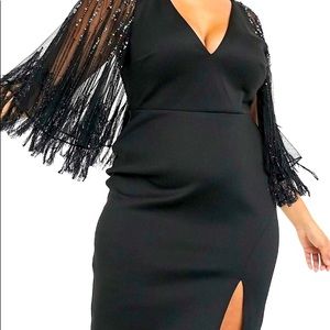 Black dress with tassel and beaded detailed cape